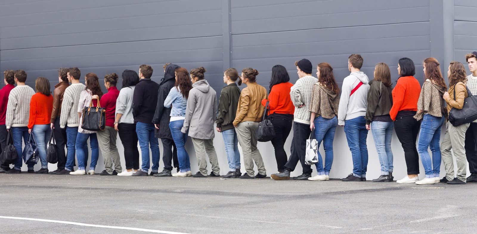 Group Of Individuals In A Queue