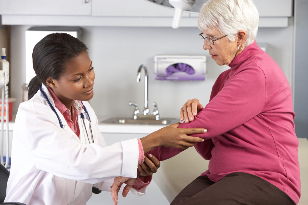 Physician Treating-Patient For Pain